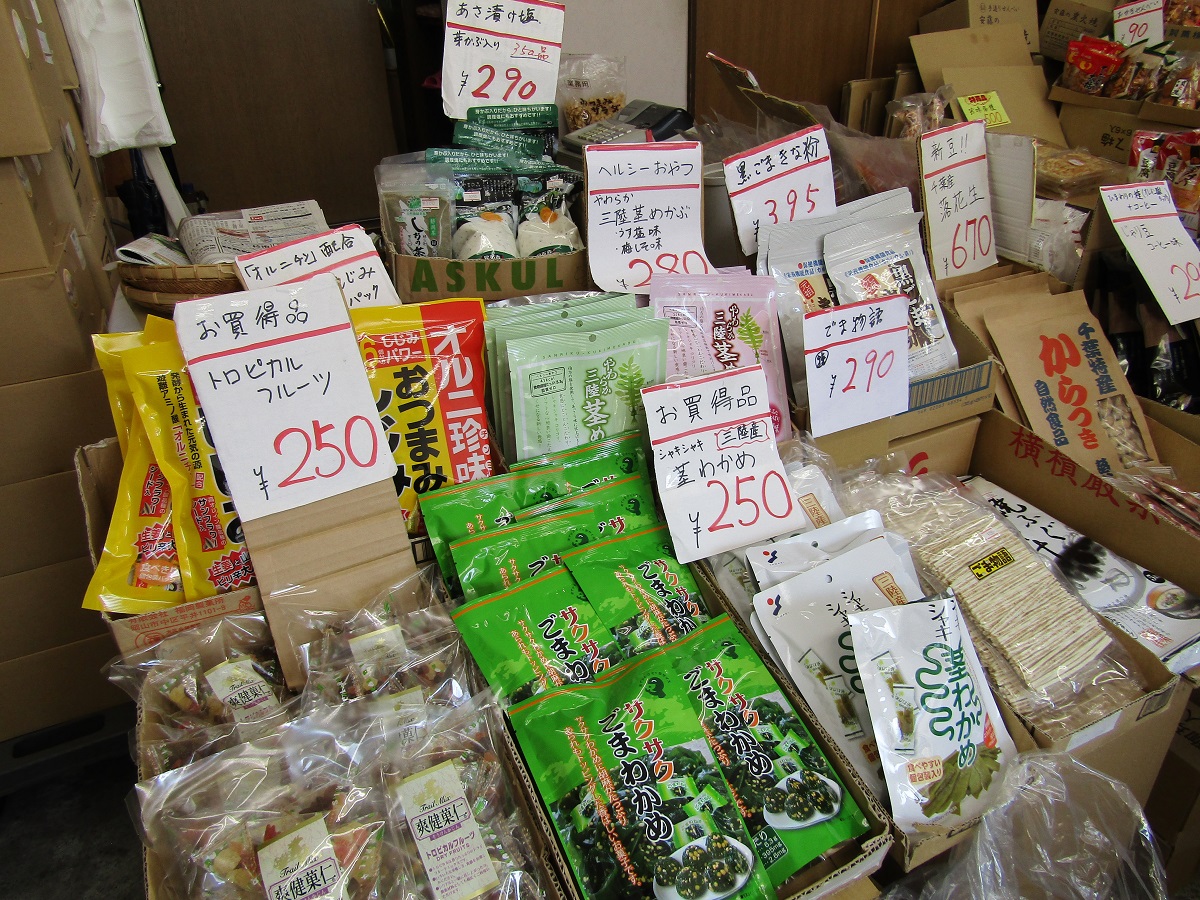 （株）丸萬